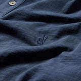 Short Sleeve Slub Cotton Polo with Peace Sign Embroidery